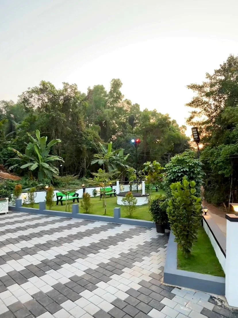 Landscaped courtyard and garden at AMB Guest House